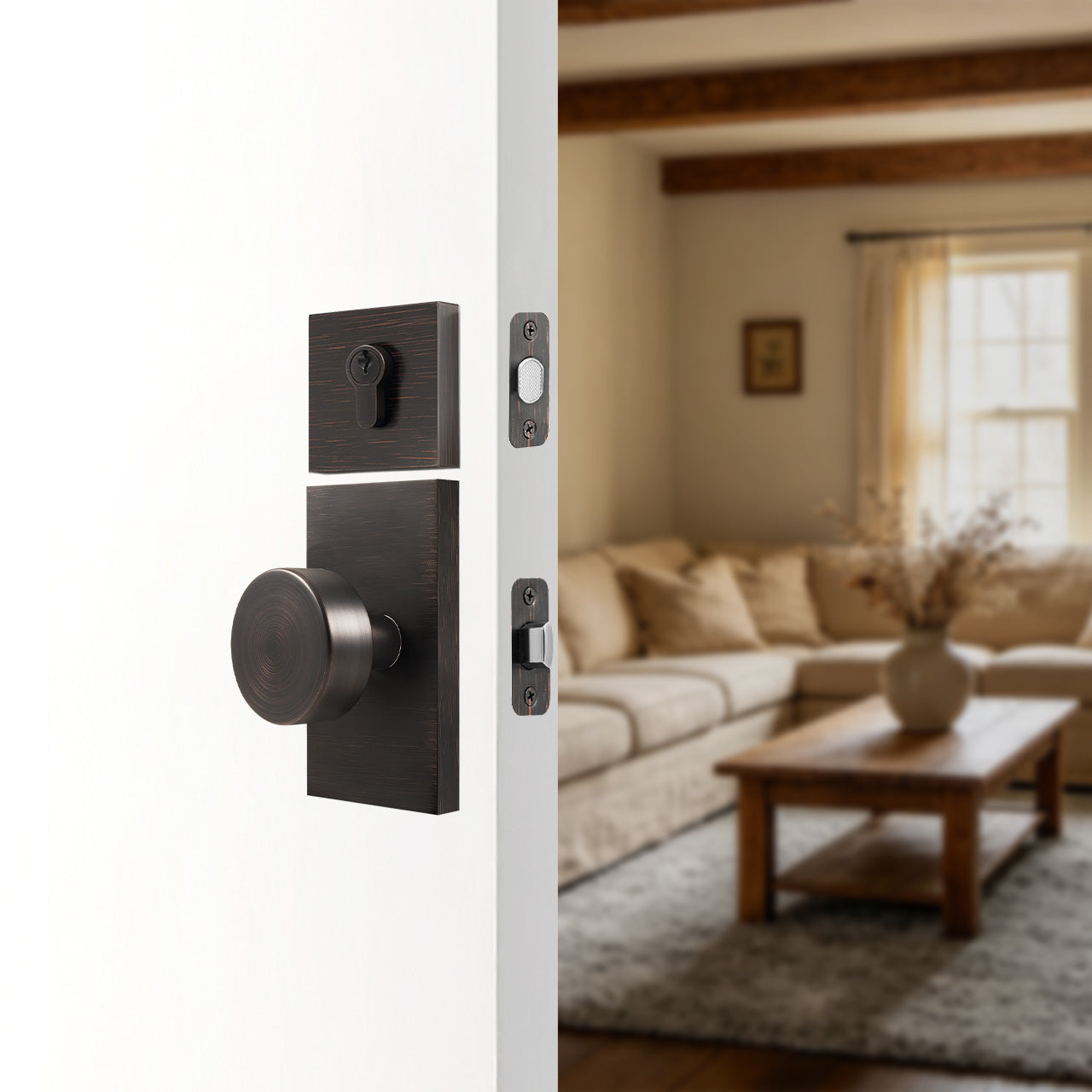 Front door knob set with deadbolt and rectangular backplate installed on exterior entry door, SENY