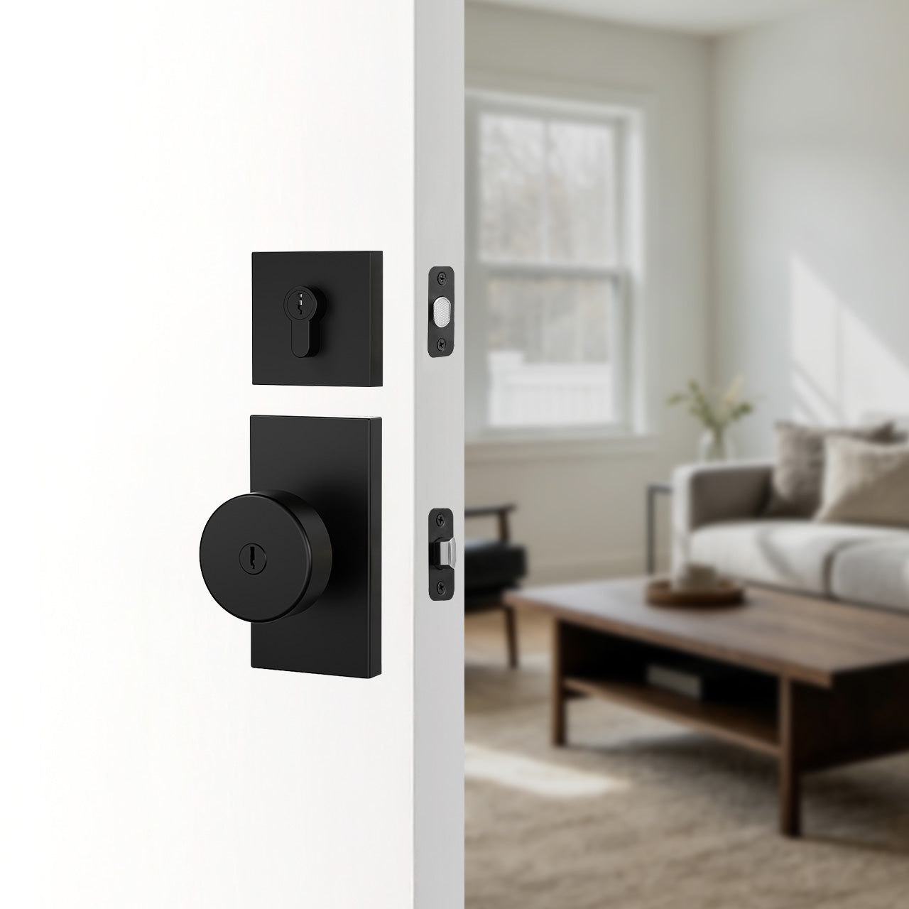 Front door knob with deadbolt and rectangular backplate installed on exterior entry door, SENY