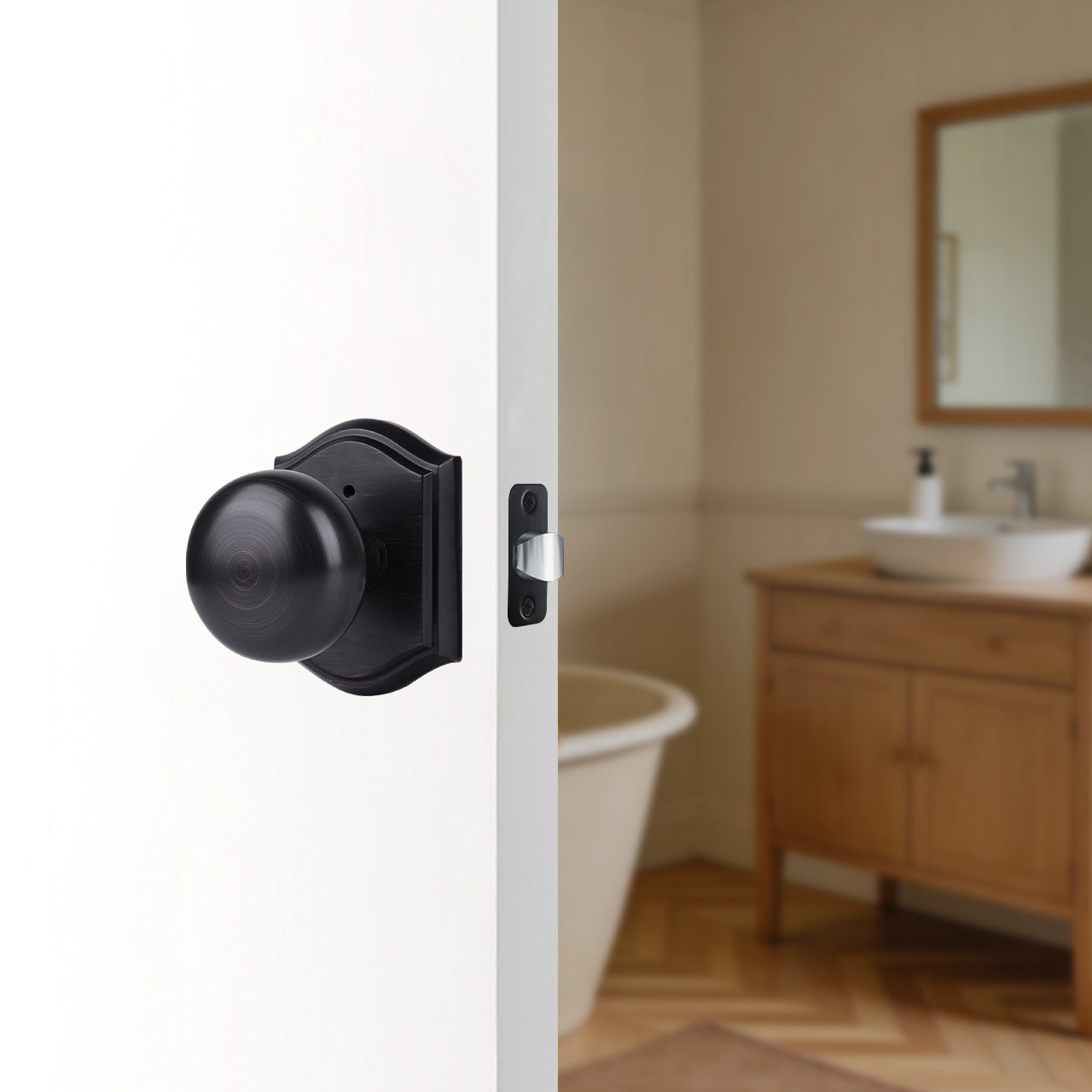 Interior door knobs with backplate installed on classic bedroom door, SENY