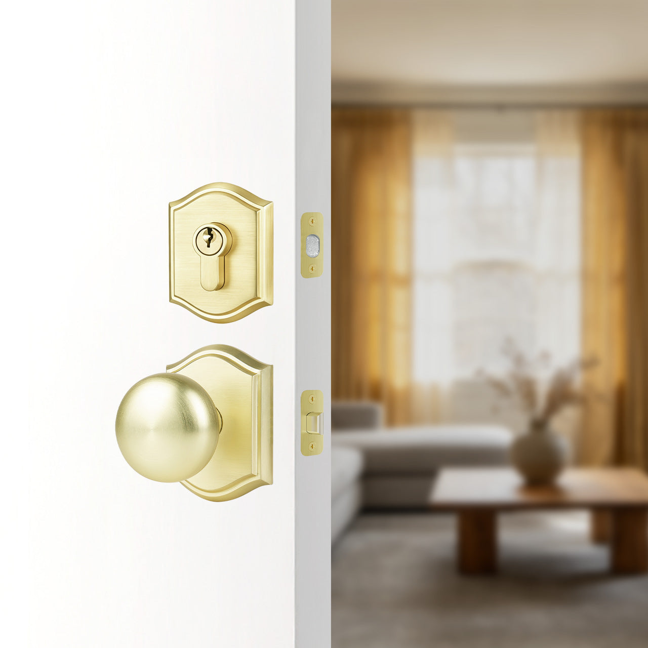 Front door knobs and deadbolts with classic arched plate design installed on exterior entry door, SENY