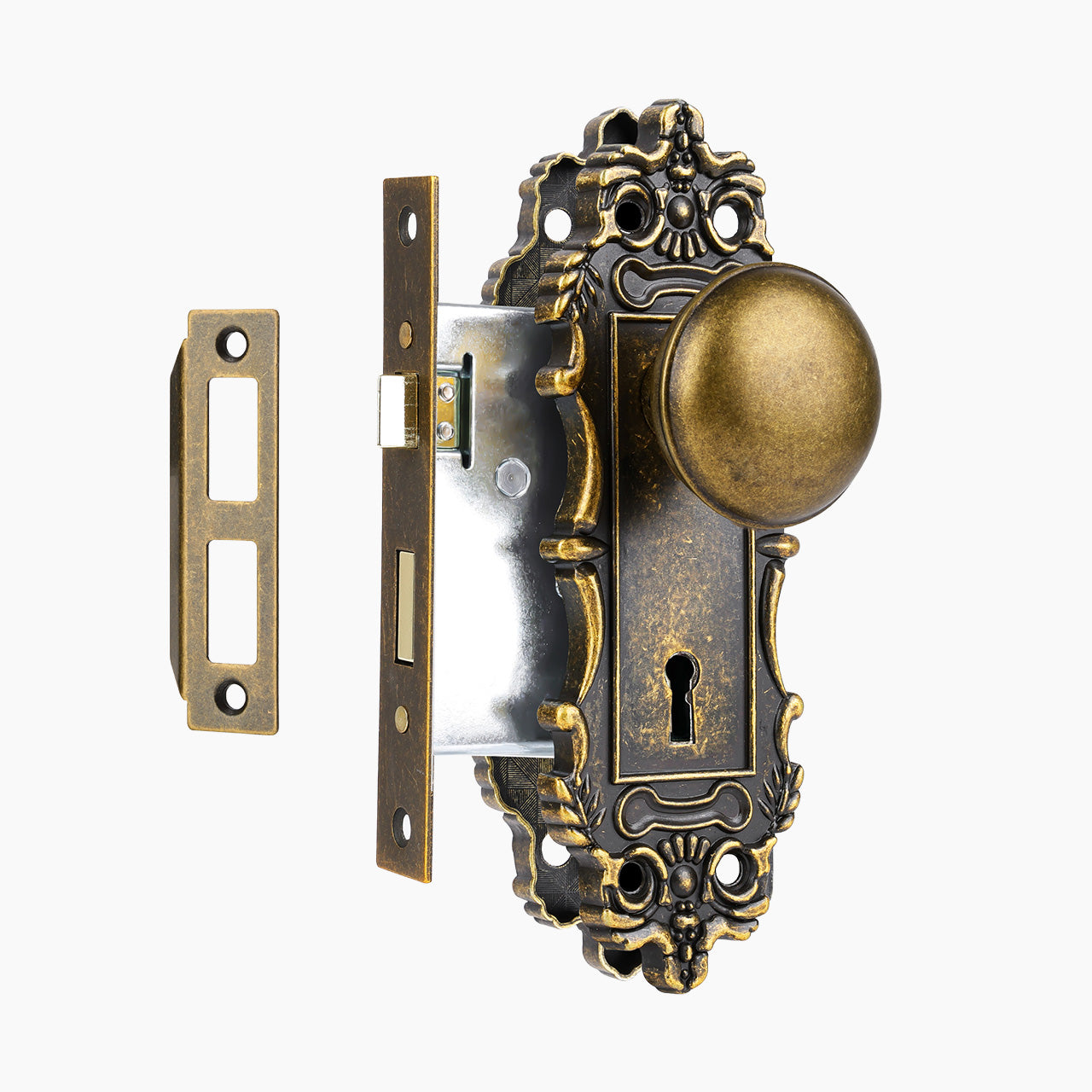 Vintage mortise lock set with ornate backplate and skeleton key design, SENY